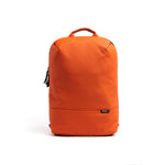 Mueslii travel backpack, made of PU coated waterproof nylon, with a laptop compartment, color orange, front view.