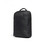Mueslii daily backpack, made of  water resistant canvas nylon, with a laptop compartment, color black, side view.