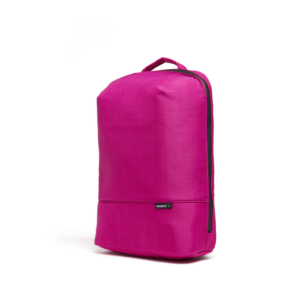 Mueslii daily backpack, made of  water resistant canvas nylon, with a laptop compartment, color fuchsia, side view.