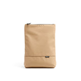 Mueslii light backpack,  made of PU coated waterproof nylon, with a laptop compartment, color sand, front view.