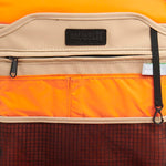 Mueslii daily backpack, made of PU coated waterproof nylon, with a laptop compartment, color sand, inside view.