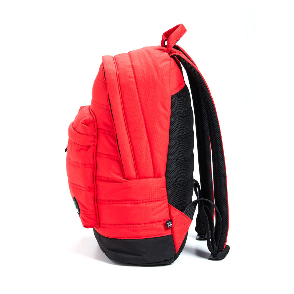 Mueslii original puffer laptop backpack made of high density nylon and Ykk zips, color matte red, side view.