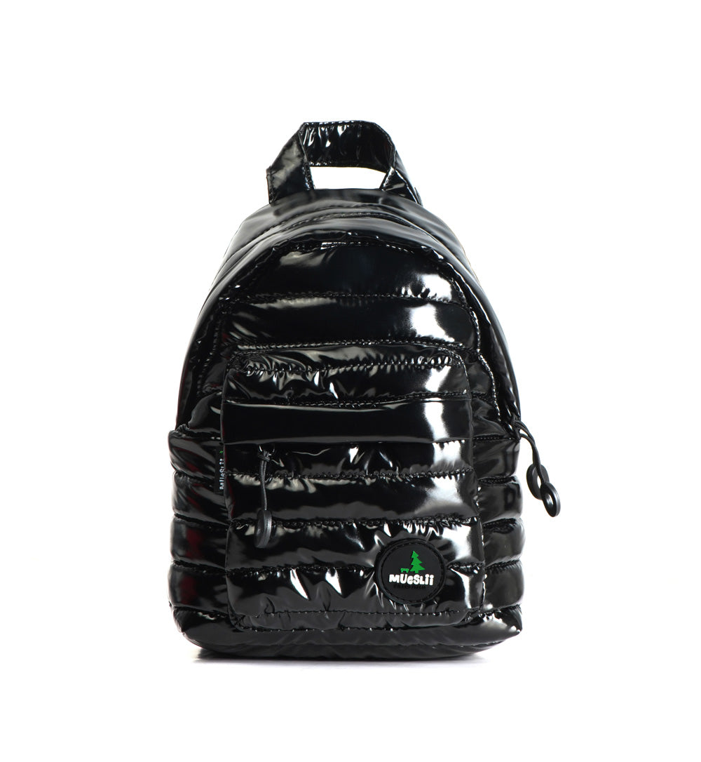 Mueslii original puffer extra small pack made of high density nylon and Ykk zips, color black, capacity 4 liters.